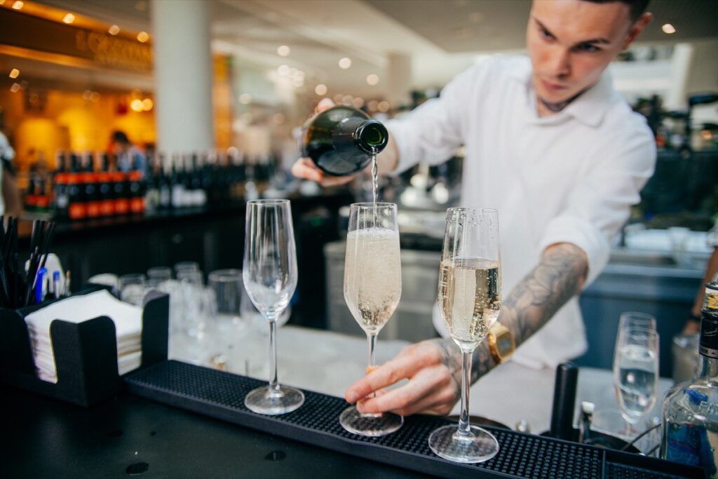 New Year's Eve bartenders pouring champagne in San Jose
