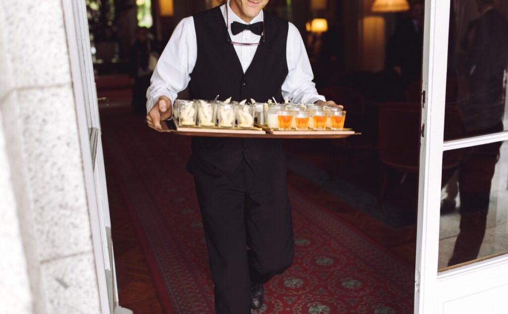 private holiday party waitstaff serving appetizers at a home in the Bay Area